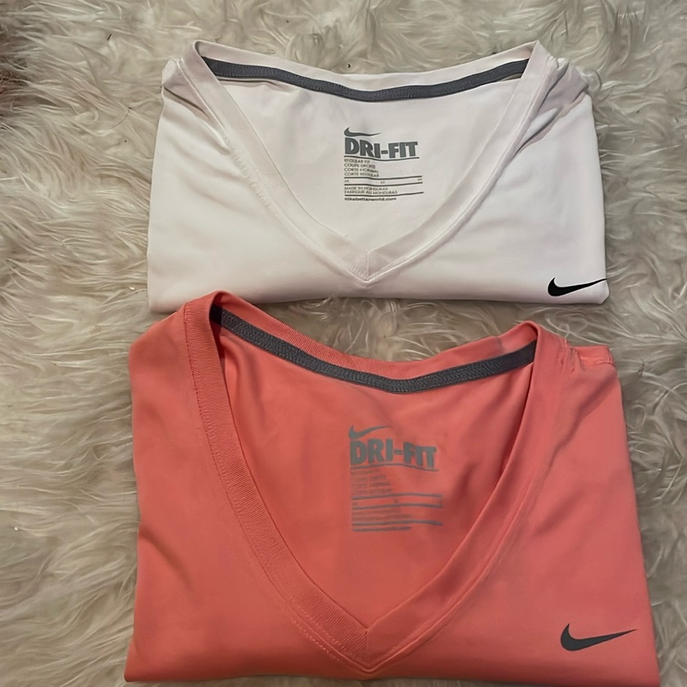 White & Coral Nike vneck dri-fit shirts. Size Medium.